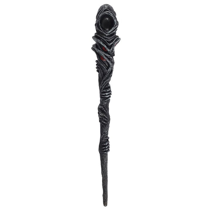 Decorative staff with textured design and red accents on a white background