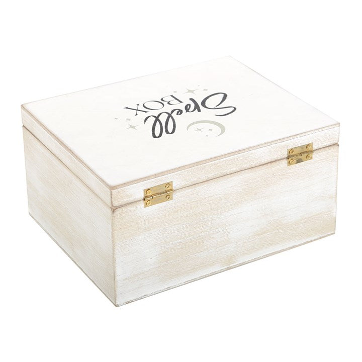 White wooden box with gold accents and engraved text on a white background
