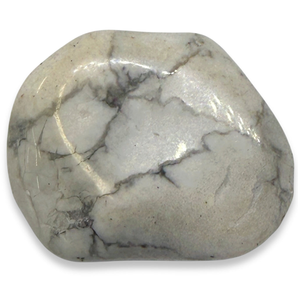 Polished stone with a marbled pattern on a white background